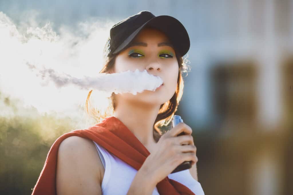 Girl vaping cannabis